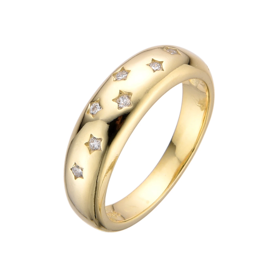 Anillo dorado grueso con estrellas de zirconia