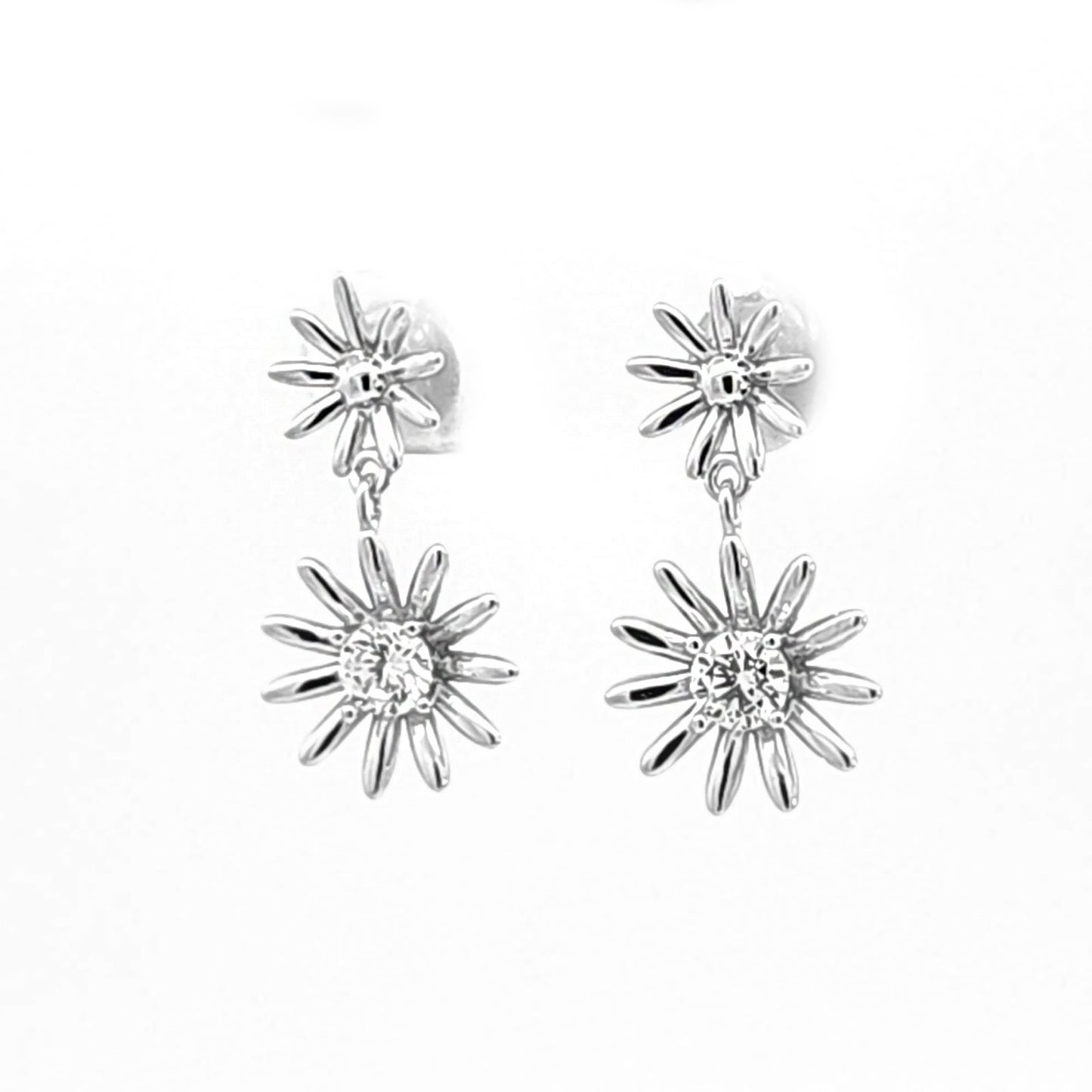 Aretes de flor doble plateado